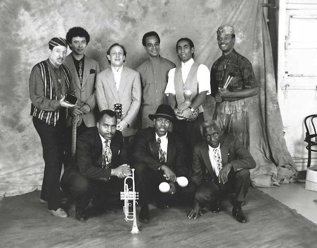 SOLE vers 1992, de g.  d.,  larrire: Daoud-David Williams, Mamdouh Bahri, Jay Levin, T.K. Blue, Greg Bufford, Bryan Carrot;  lavant: Carlos Francis, Everald Brown, Cliff Walston © Photo X, Collection T.K. Blue, by courtesy